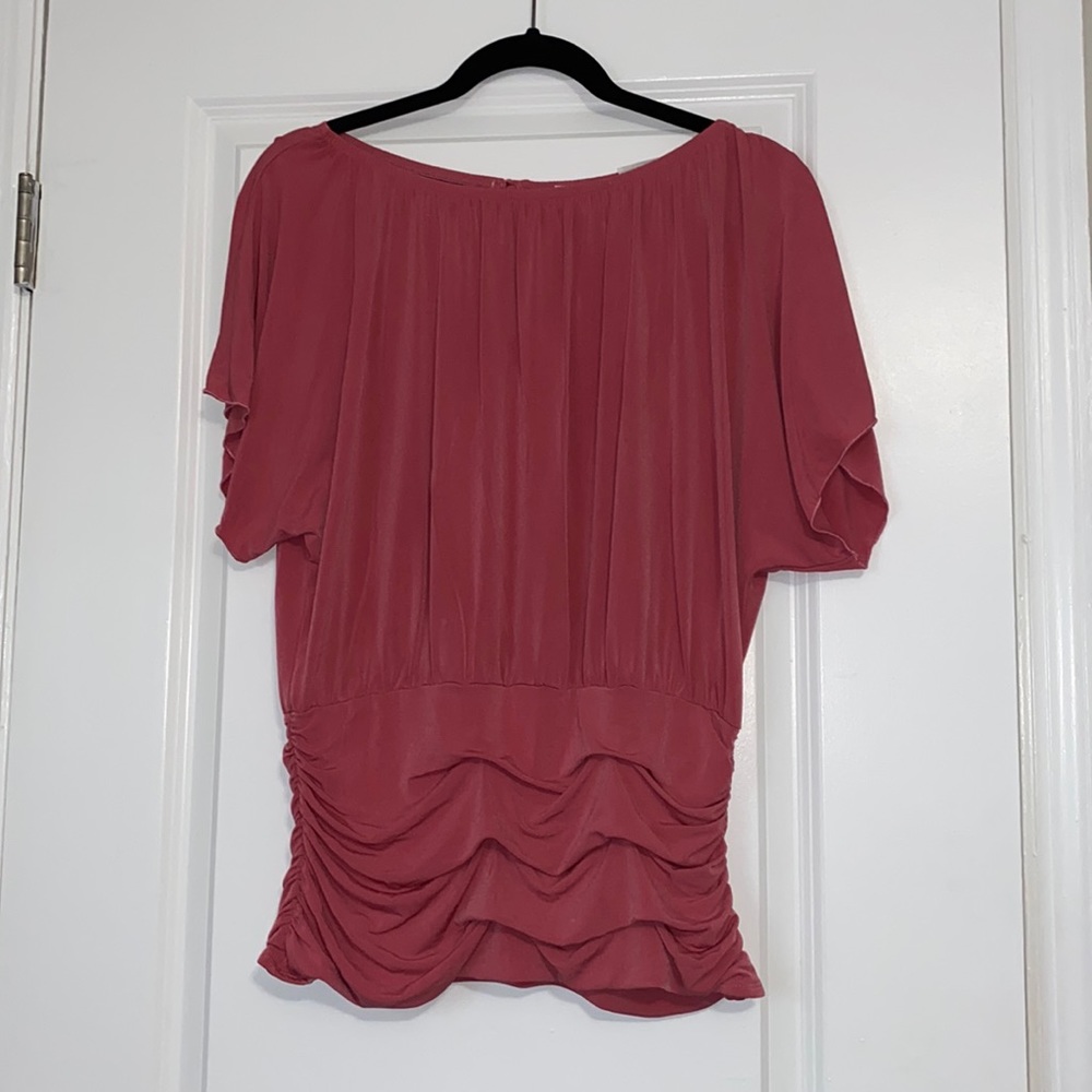 Women rose colored blouse